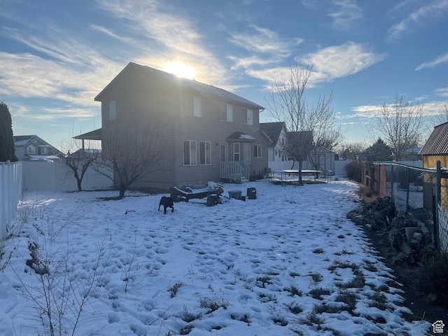 564 W 475 N, Clearfield, UT 84015 - snow covered rear of property featuring fence