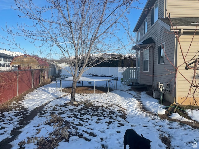 564 W 475 N, Clearfield, UT 84015 - yard covered in snow with a trampoline and fence