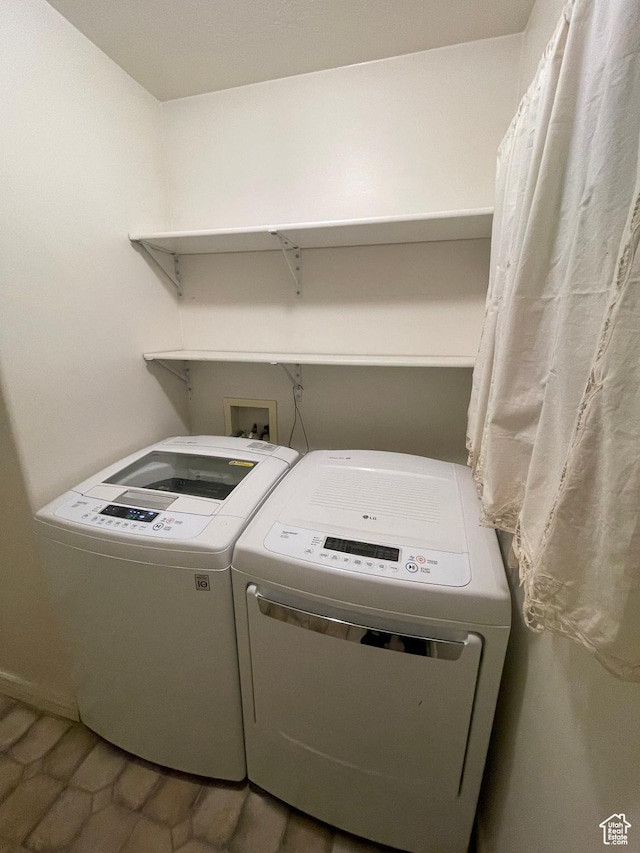 564 W 475 N, Clearfield, UT 84015 - clothes washing area with tile patterned floors, laundry area, and independent washer and dryer