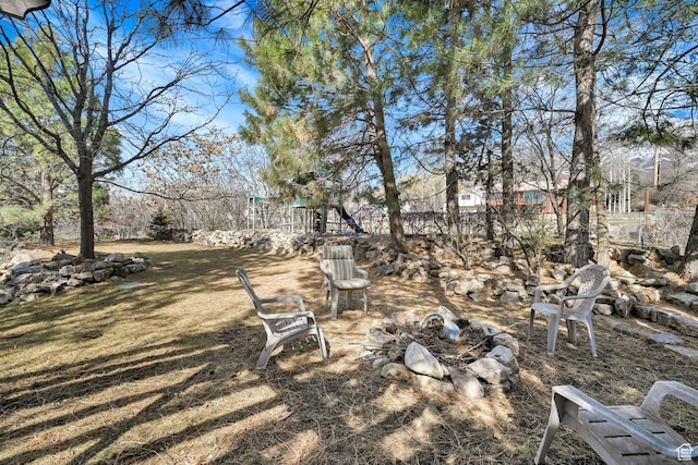 654 E 3225 N, North Ogden, UT 84414 - view of yard featuring an outdoor fire pit