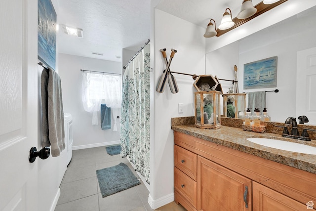 654 E 3225 N, North Ogden, UT 84414 - bathroom with a textured ceiling, visible vents, tile patterned flooring, and vanity