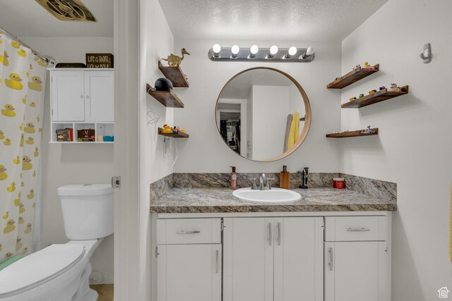 1384 Millcreek Dr Unit 6, Ogden, UT 84404 - bathroom with toilet, vanity, and a shower with curtain