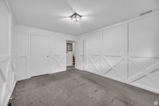 1384 Millcreek Dr Unit 6, Ogden, UT 84404 - interior space featuring a decorative wall and visible vents