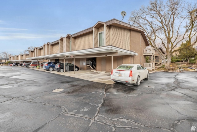 exterior space with covered parking
