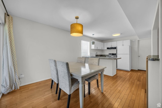 1384 Millcreek Dr Unit 6, Ogden, UT 84404 - dining room with baseboards and light wood finished floors