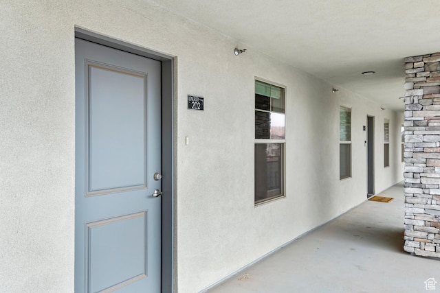 128 N Lone Rock Dr Unit 202, Hurricane, UT 84737 - entrance to property with stone siding and stucco siding