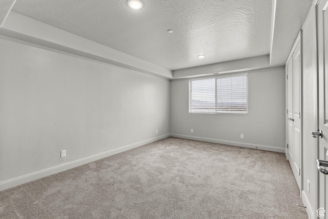 128 N Lone Rock Dr Unit 202, Hurricane, UT 84737 - unfurnished bedroom featuring carpet, baseboards, and a textured ceiling