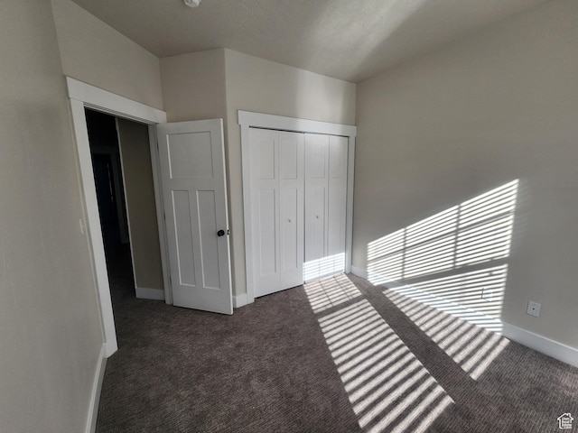 1972 Grant Ave, Ogden, UT 84401 - unfurnished bedroom featuring a closet, baseboards, and carpet