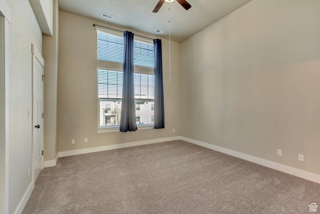 1972 Grant Ave, Ogden, UT 84401 - spare room featuring visible vents, baseboards, ceiling fan, and carpet floors