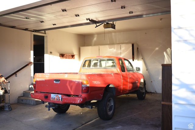 garage featuring a garage door opener