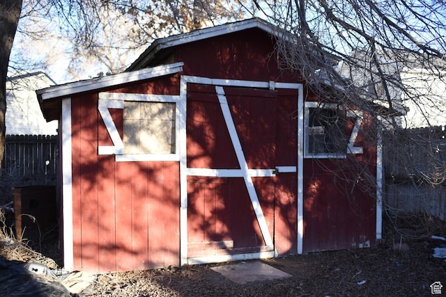 view of outdoor structure featuring an outdoor structure and fence