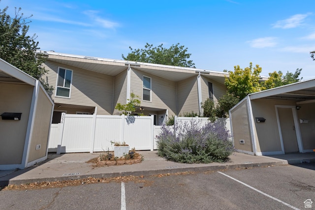 5354 S Baldwin Park, Murray, UT 84123 - view of front of house with uncovered parking and fence
