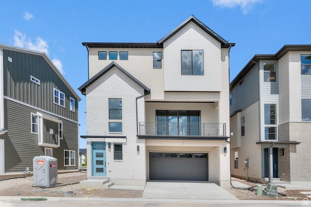 view of front of house with a garage, concrete driveway, and brick siding