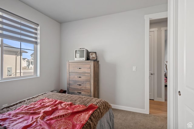 5715 Brambling Way E, Stansbury Park, UT 84074 - bedroom featuring carpet floors and baseboards