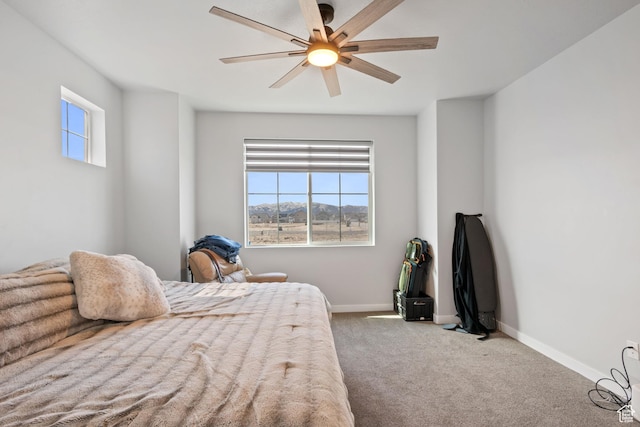 5715 Brambling Way E, Stansbury Park, UT 84074 - bedroom with carpet flooring, baseboards, and a ceiling fan