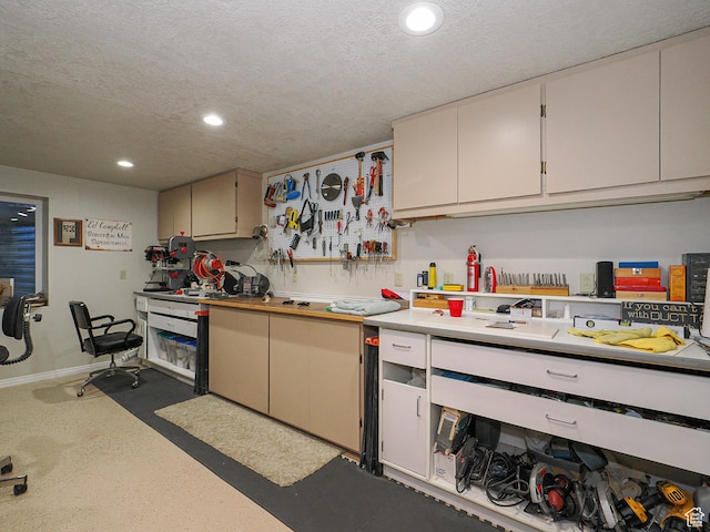 121 E Amber Rd, Saratoga Springs, UT 84045 - kitchen with recessed lighting, a textured ceiling, light countertops, and baseboards