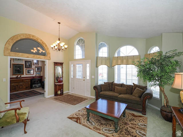 121 E Amber Rd, Saratoga Springs, UT 84045 - living room featuring carpet floors, a chandelier, baseboards, and a towering ceiling