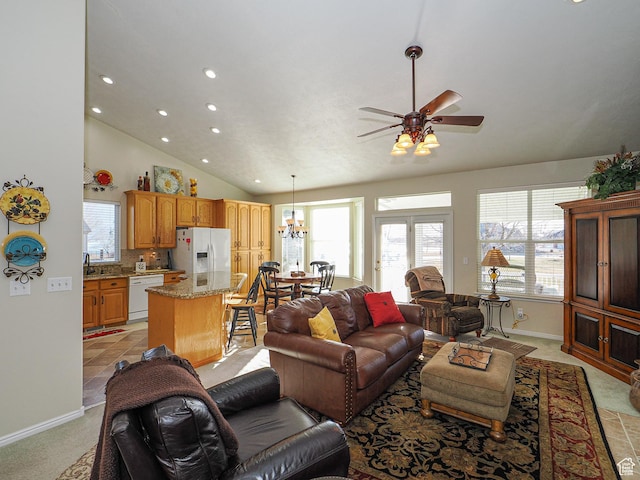 121 E Amber Rd, Saratoga Springs, UT 84045 - living area featuring vaulted ceiling, recessed lighting, ceiling fan, a chandelier, and baseboards