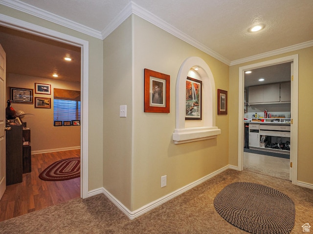 121 E Amber Rd, Saratoga Springs, UT 84045 - corridor with carpet floors, ornamental molding, baseboards, recessed lighting, and wood finished floors