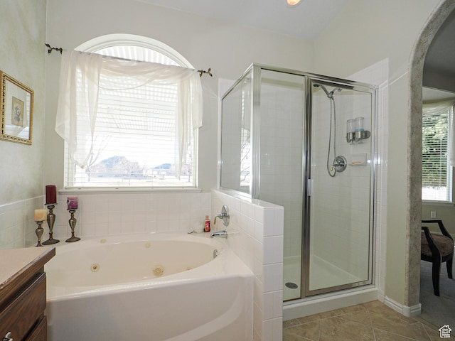 121 E Amber Rd, Saratoga Springs, UT 84045 - full bath featuring a stall shower, a jetted tub, and tile patterned floors