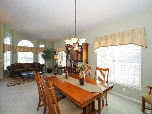 121 E Amber Rd, Saratoga Springs, UT 84045 - dining area with a chandelier, light colored carpet, plenty of natural light, baseboards, and lofted ceiling