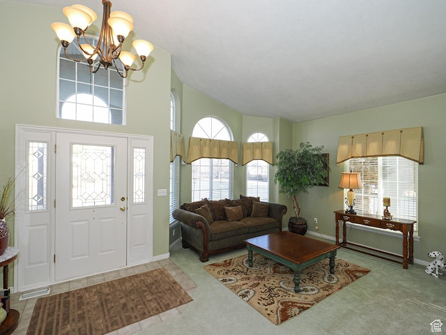 121 E Amber Rd, Saratoga Springs, UT 84045 - foyer featuring a chandelier, high vaulted ceiling, carpet flooring, and baseboards