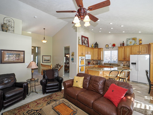 121 E Amber Rd, Saratoga Springs, UT 84045 - living area with high vaulted ceiling, a ceiling fan, and light colored carpet