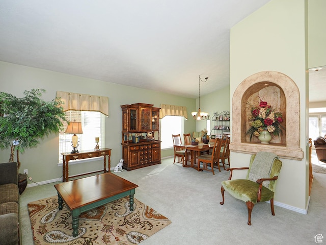 121 E Amber Rd, Saratoga Springs, UT 84045 - living room featuring carpet, a chandelier, and baseboards