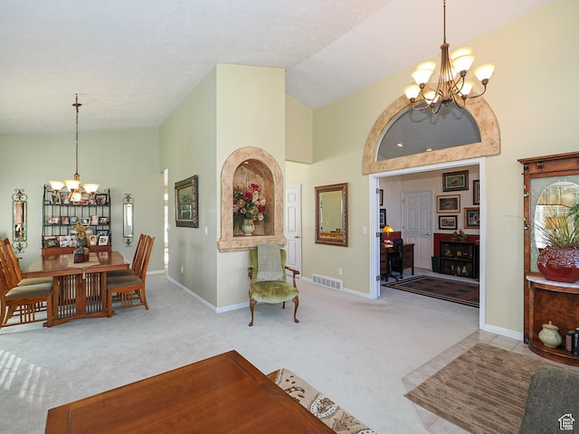 121 E Amber Rd, Saratoga Springs, UT 84045 - carpeted dining area with a chandelier, high vaulted ceiling, and baseboards