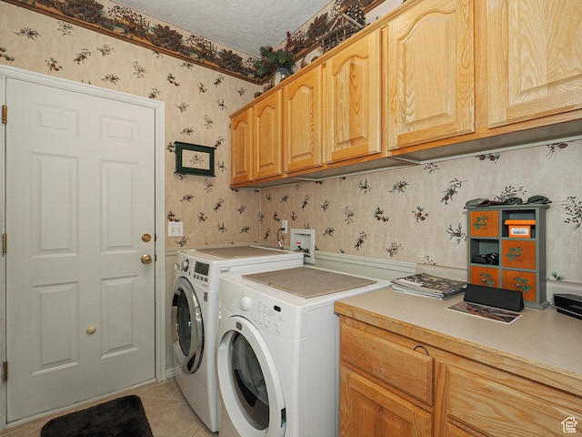 121 E Amber Rd, Saratoga Springs, UT 84045 - laundry area featuring wallpapered walls, cabinet space, independent washer and dryer, and light tile patterned floors