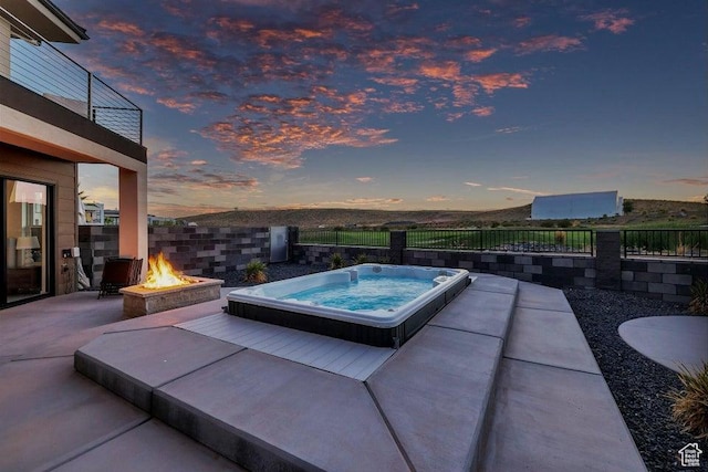 1478 W Torrey Rd, Hurricane, UT 84737 - view of swimming pool featuring an outdoor fire pit, a patio area, a fenced backyard, and hot tub deck surround