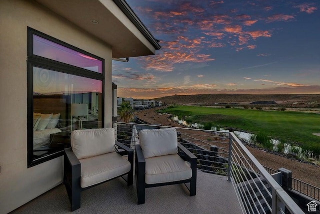 1478 W Torrey Rd, Hurricane, UT 84737 - patio terrace at dusk with a balcony and a water view