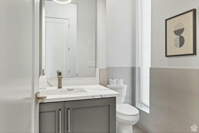 1478 W Torrey Rd, Hurricane, UT 84737 - half bath featuring toilet, tile walls, and vanity