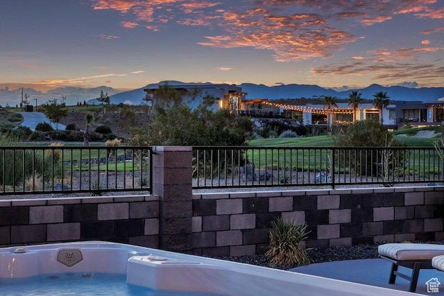 1478 W Torrey Rd, Hurricane, UT 84737 - view of pool with a mountain view, a hot tub, and fence
