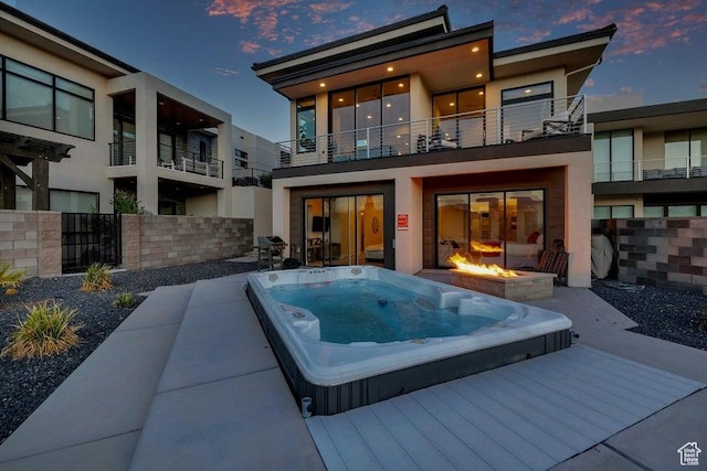 1478 W Torrey Rd, Hurricane, UT 84737 - rear view of house featuring fence, a fire pit, and stucco siding