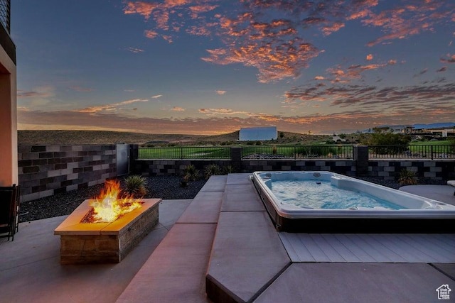 1478 W Torrey Rd, Hurricane, UT 84737 - view of swimming pool with fence, a fire pit, and an outdoor hot tub