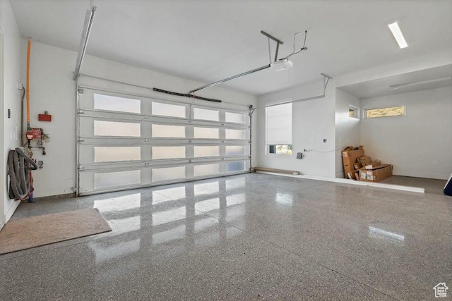 1478 W Torrey Rd, Hurricane, UT 84737 - garage with a garage door opener and baseboards