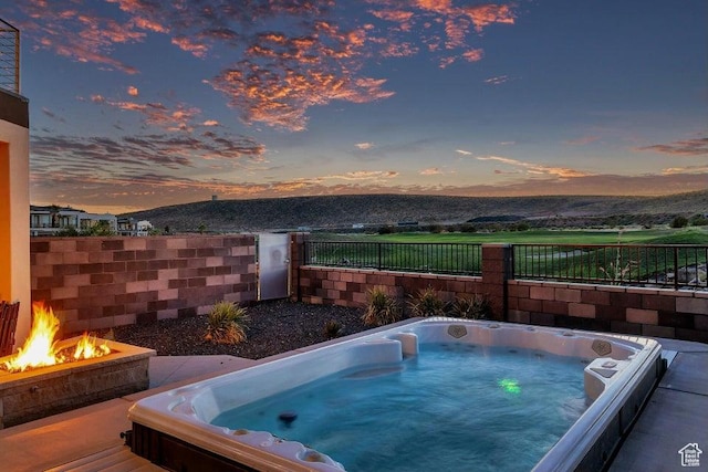 1478 W Torrey Rd, Hurricane, UT 84737 - view of pool with fence, a mountain view, and hot tub deck surround