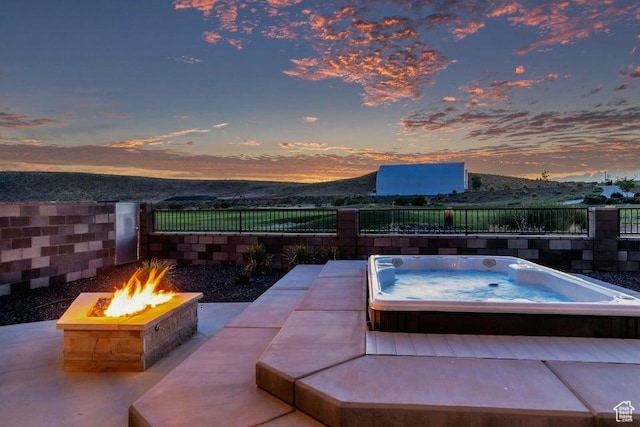 1478 W Torrey Rd, Hurricane, UT 84737 - view of swimming pool featuring hot tub deck surround, fence, and an outdoor fire pit