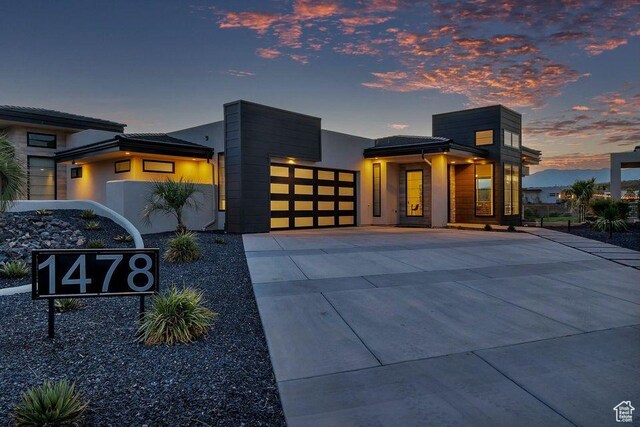 1478 W Torrey Rd, Hurricane, UT 84737 - modern home with concrete driveway and an attached garage