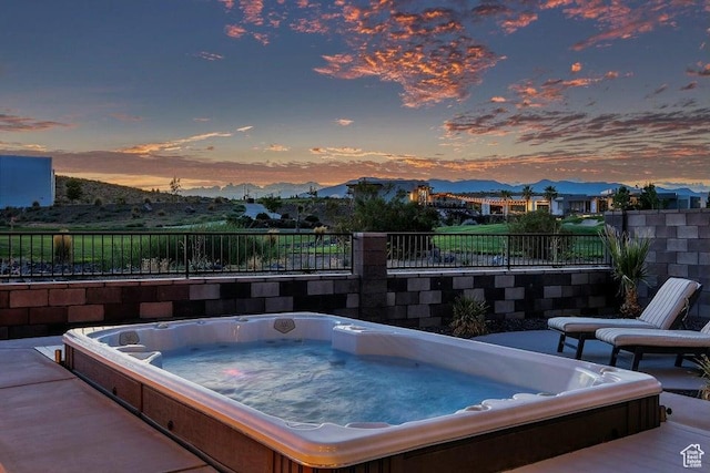 1478 W Torrey Rd, Hurricane, UT 84737 - view of swimming pool featuring hot tub deck surround, fence, and a mountain view