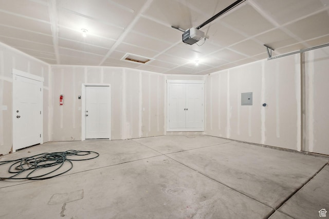 3361 W Sophie Ln, West Haven, UT 84401 - garage with electric panel and a garage door opener