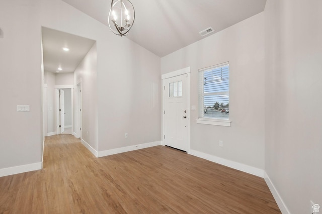 3361 W Sophie Ln, West Haven, UT 84401 - entryway with visible vents, an inviting chandelier, light wood-type flooring, and baseboards