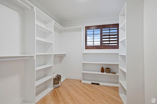 9971 S Dunsinane Dr W, South Jordan, UT 84009 - walk in closet featuring visible vents and wood finished floors