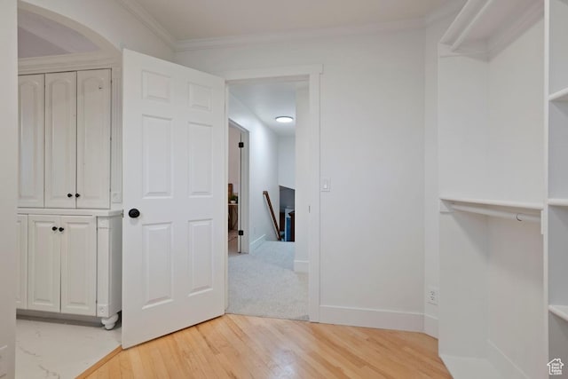 9971 S Dunsinane Dr W, South Jordan, UT 84009 - corridor featuring ornamental molding, light wood-type flooring, an upstairs landing, and baseboards