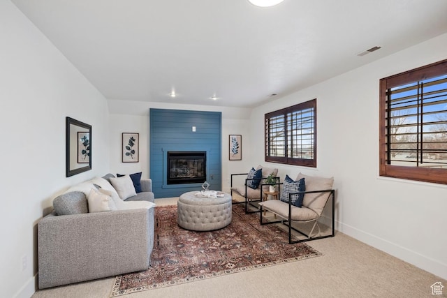 9971 S Dunsinane Dr W, South Jordan, UT 84009 - carpeted living area with a large fireplace, baseboards, and visible vents