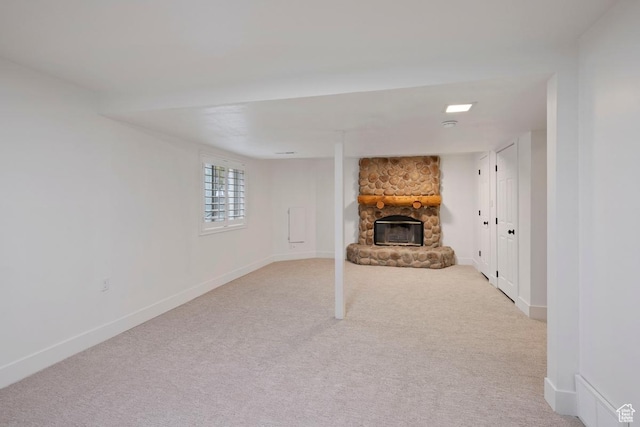 9971 S Dunsinane Dr W, South Jordan, UT 84009 - unfurnished living room featuring carpet floors, a fireplace, and baseboards