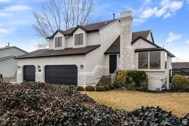 9971 S Dunsinane Dr W, South Jordan, UT 84009 - view of front of house with a chimney, stucco siding, a shingled roof, a front yard, and stone siding