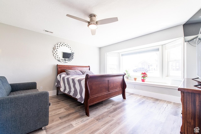 1027 S 920 W, Hurricane, UT 84737 - bedroom featuring light wood-style floors, visible vents, ceiling fan, and baseboards