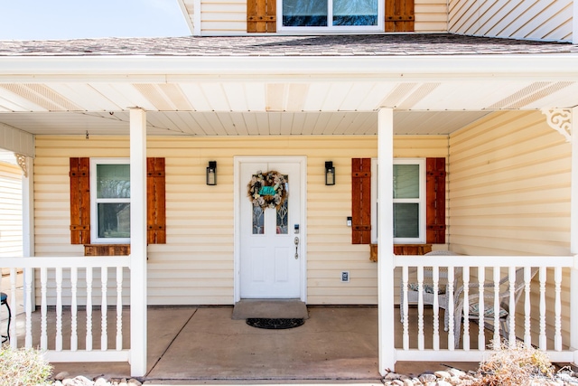 1027 S 920 W, Hurricane, UT 84737 - property entrance with a porch and roof with shingles